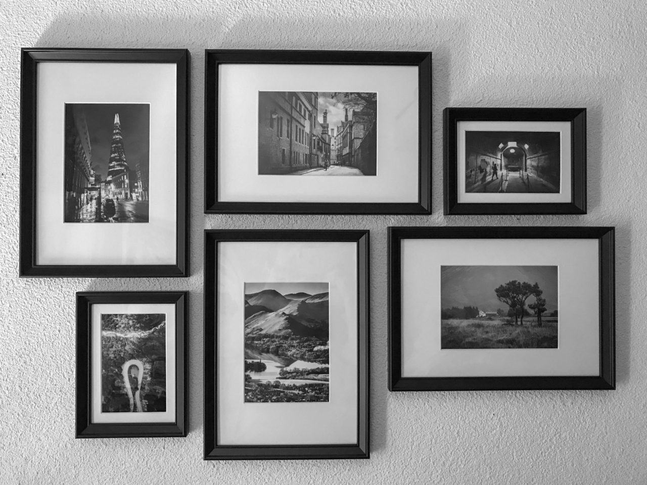 Black-and-white photos on my office wall