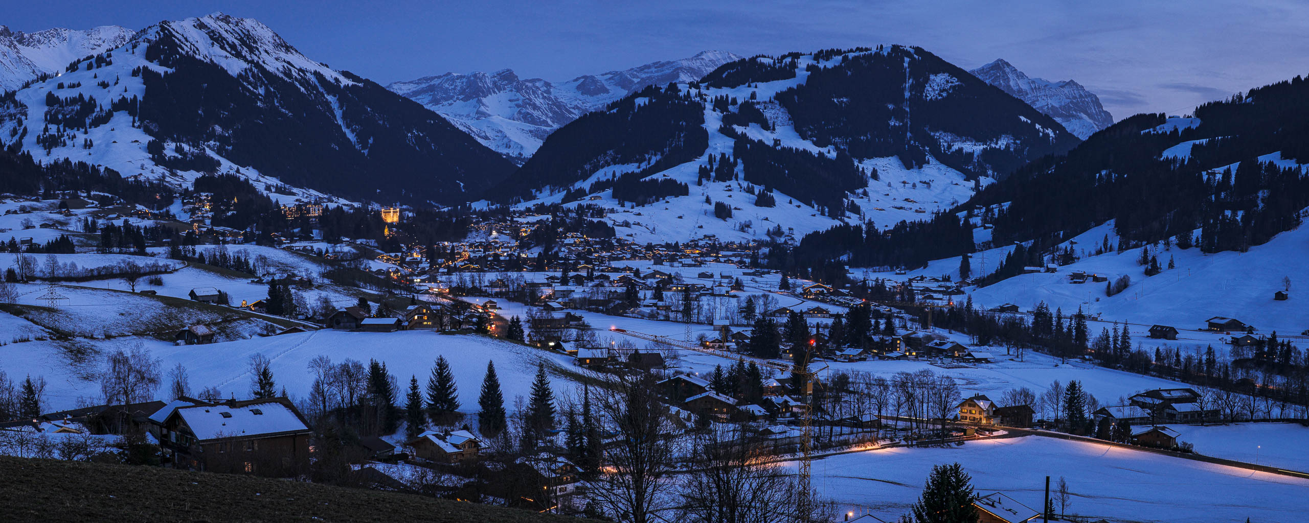 Panorama photo of Gstaad at blue hour