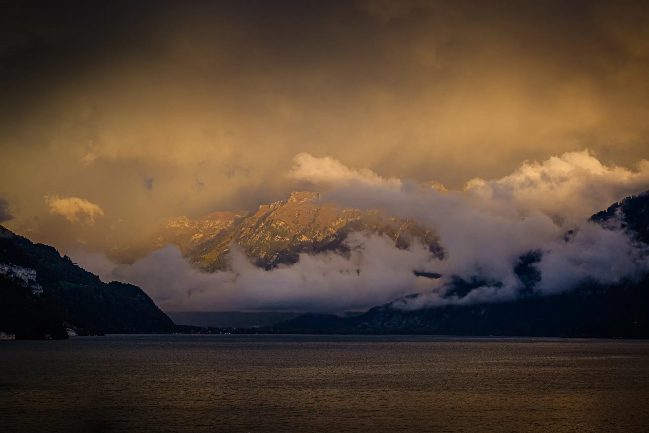 Sunlit rain clouds above Interlaken