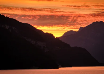 Bright orange pre-dawn sky over Interlaken
