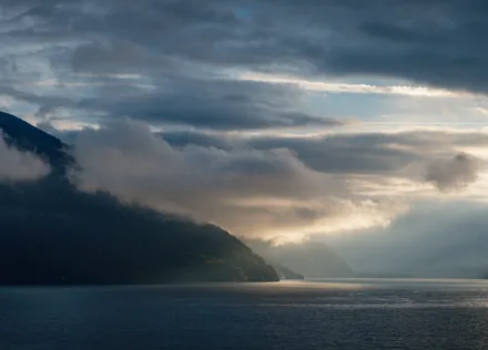 Cloudy sunrise over Lake Thun