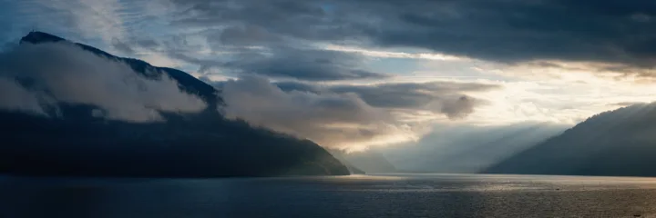 Cloudy sunrise over Lake Thun