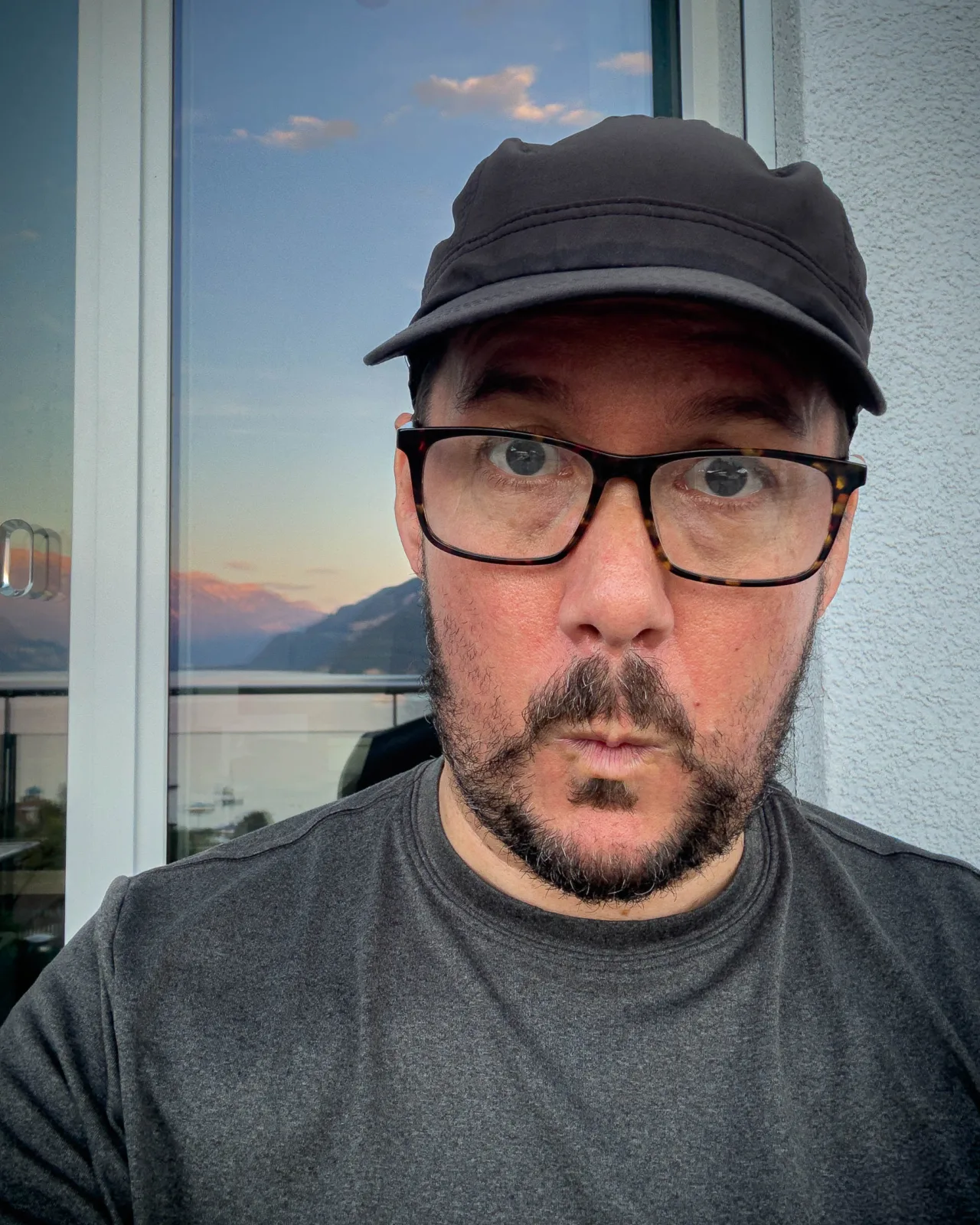 Selfie on the balcony at home after hiking, September 2025