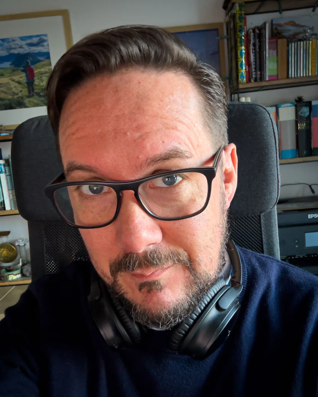 Selfie after a haircut in my home office